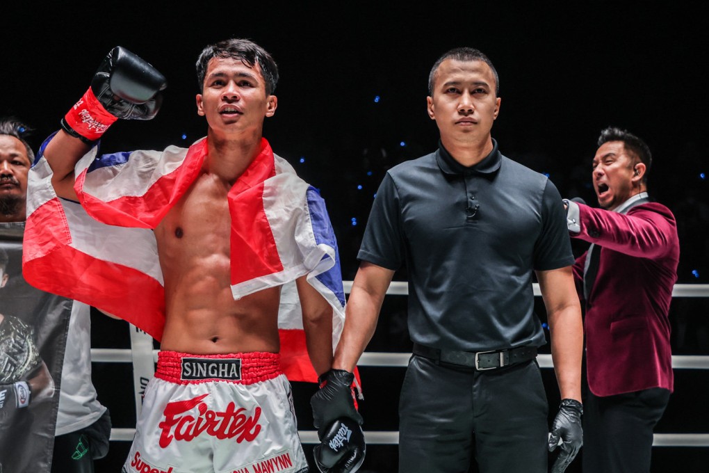Paopom Watcharin gets set to raise Superbon’s hand after his win over Tayfun Ozcan at ONE Fight Night 11 in Bangkok. Photos: ONE Championship