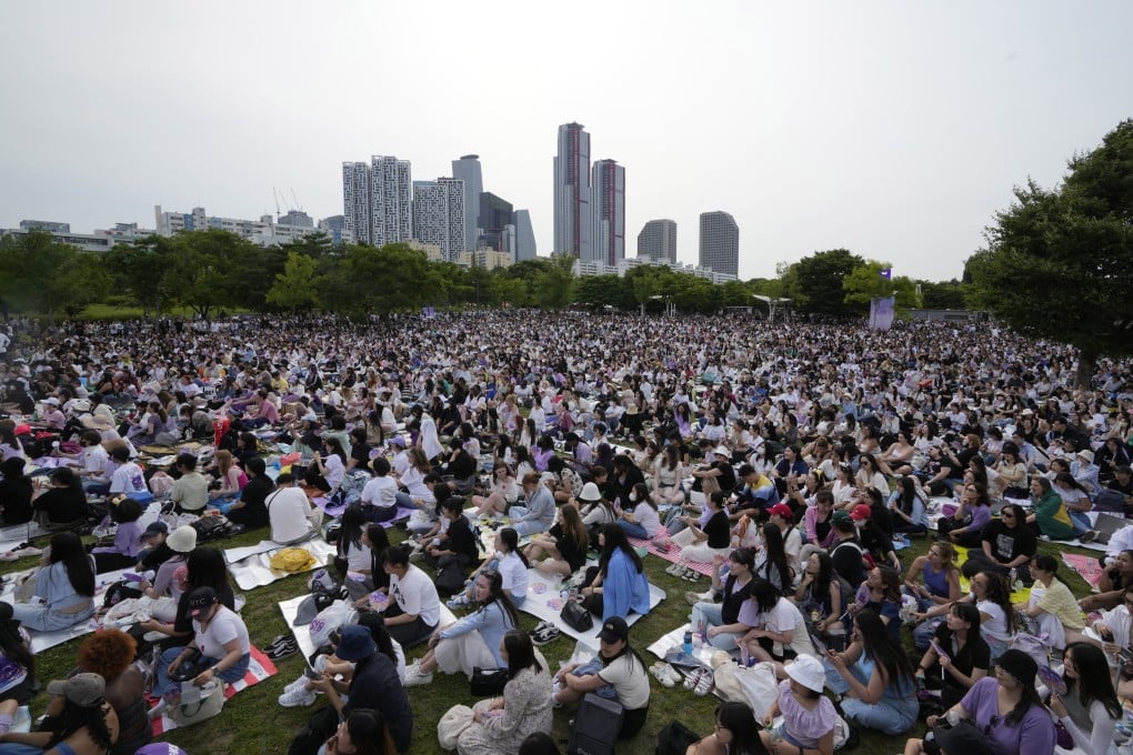Fans of BTS gather at a park near the Han River in Seoul, South Korea, during an event to celebrate the 10th anniversary of the K-pop band. Photo: APS