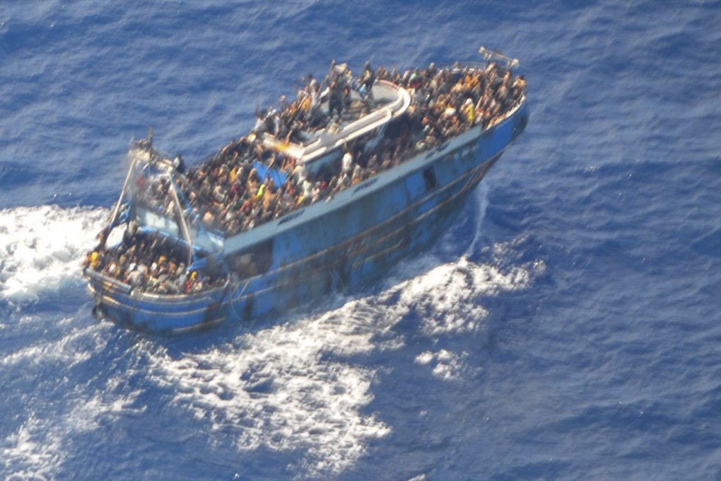 The battered fishing boat crammed with people that later capsized and sank off southern Greece. Photo: AP