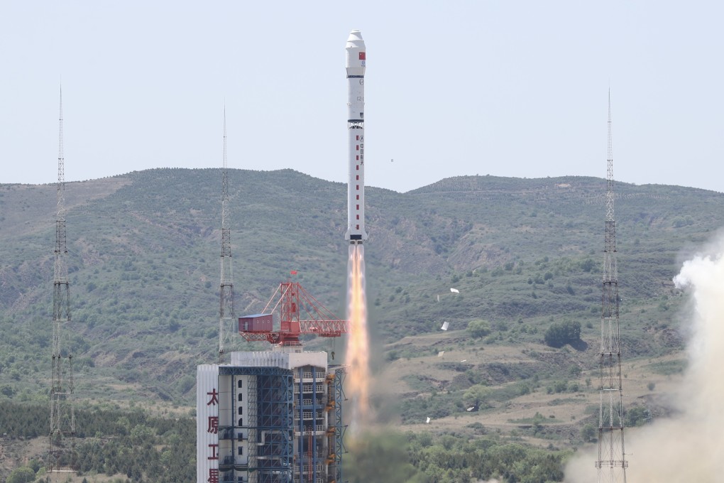 A Long March rocket blasts off from the Taiyuan Satellite Launch Centre in northern China carrying 41 satellites into orbit. Photo: Xinhua