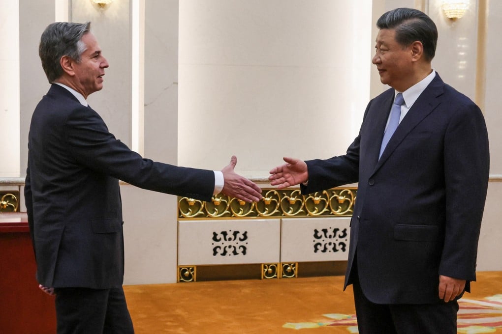Chinese President Xi Jinping (right) greets US Secretary of State Antony Blinken in the Great Hall of the People in Beijing on Monday. Photo: Reuters