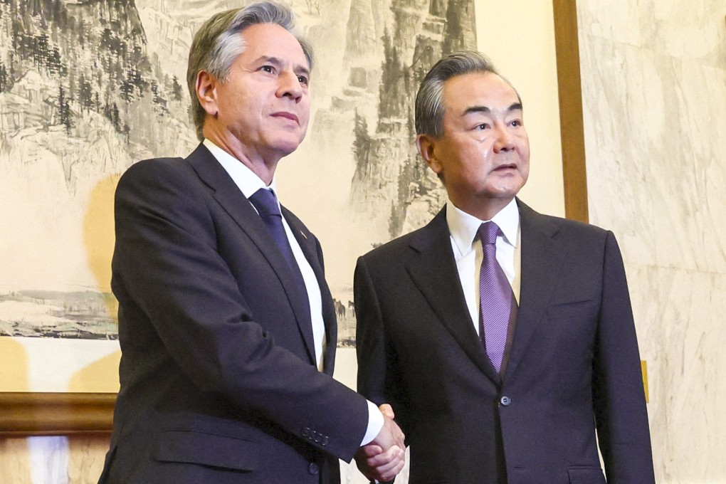 US Secretary of State Antony Blinken (L) shakes hands with China’s Director of the Office of the Central Foreign Affairs Commission Wang Yi in Beijing on June 19, 2023. Photo: AFP