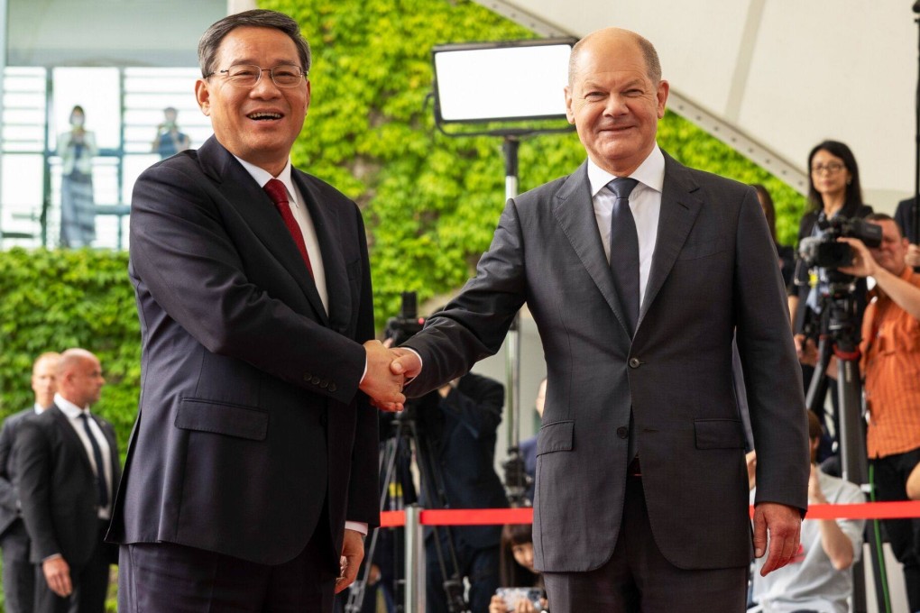 German Chancellor Olaf Scholz (right) shakes hands with Chinese Premier Li Qiang during their meeting in Berlin on Tuesday. Li chose Germany as the first stop of his inaugural overseas trip as premier. Photo: Bloomberg