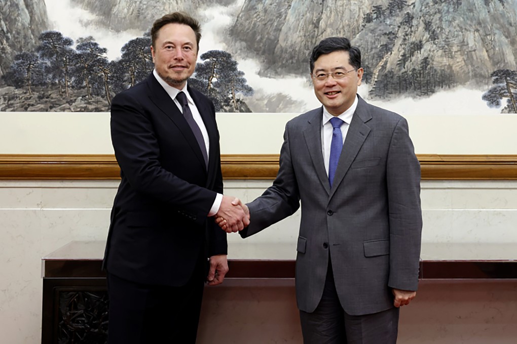 China’s Foreign Minister Qin Gang poses with Tesla CEO Elon Musk in Beijing. Photo: Ministry of Foreign Affairs of the People’s Republic of China via AP
