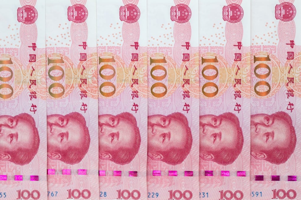 Chinese one-hundred yuan banknotes are arranged for a photograph. Photo: Bloomberg