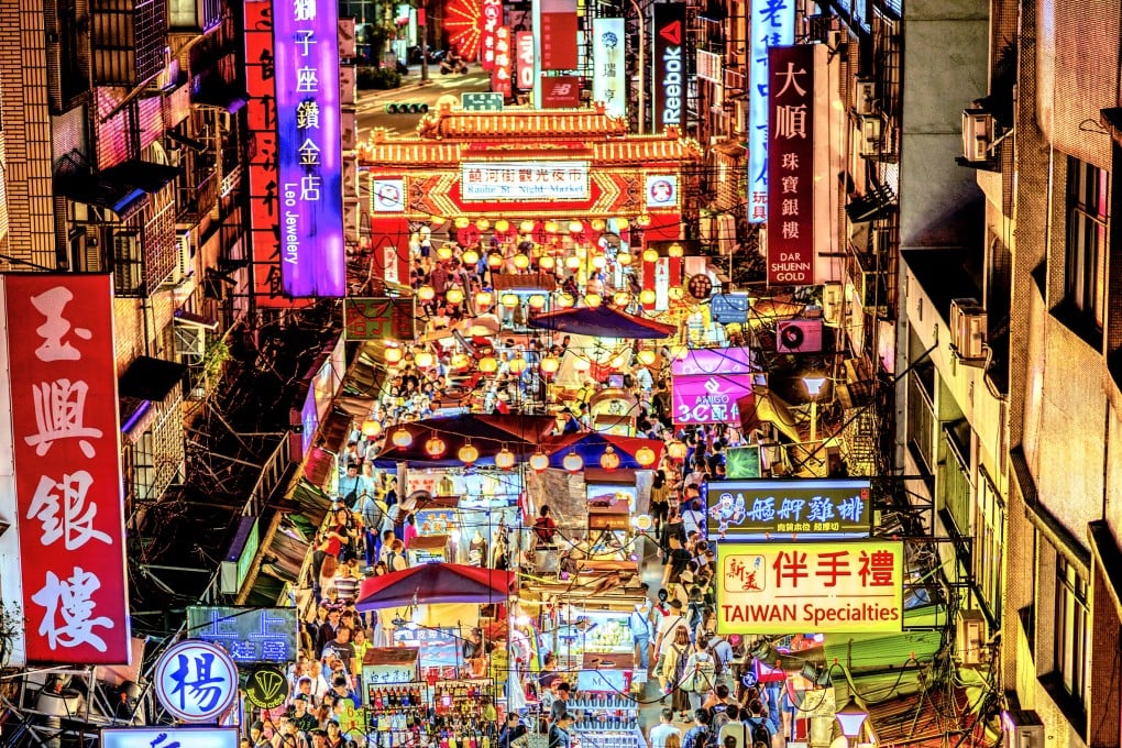 Taiwan’s lively Raohe Night Market in Songshan District, Taipei City. Photo: Getty Images