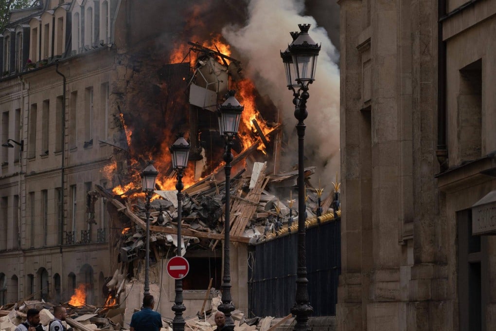 The strong explosion rocked a building in Paris, igniting a fire that sent smoke soaring over the French capital’s monuments. Photo: AFP