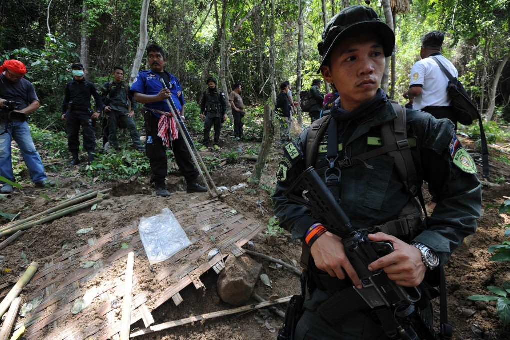 Bamboo covers the many graves found in Thailand’s southern Songkhla province bordering Malaysia. Photo: AFP
