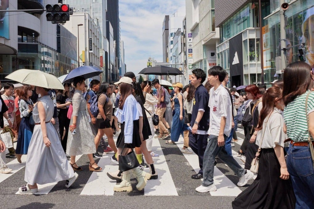 People cross a street in a Tokyo shopping district on Saturday. Roughly 27 million people in Japan are millennials, defined as those born between 1981 to 1996. Photo: Bloomberg