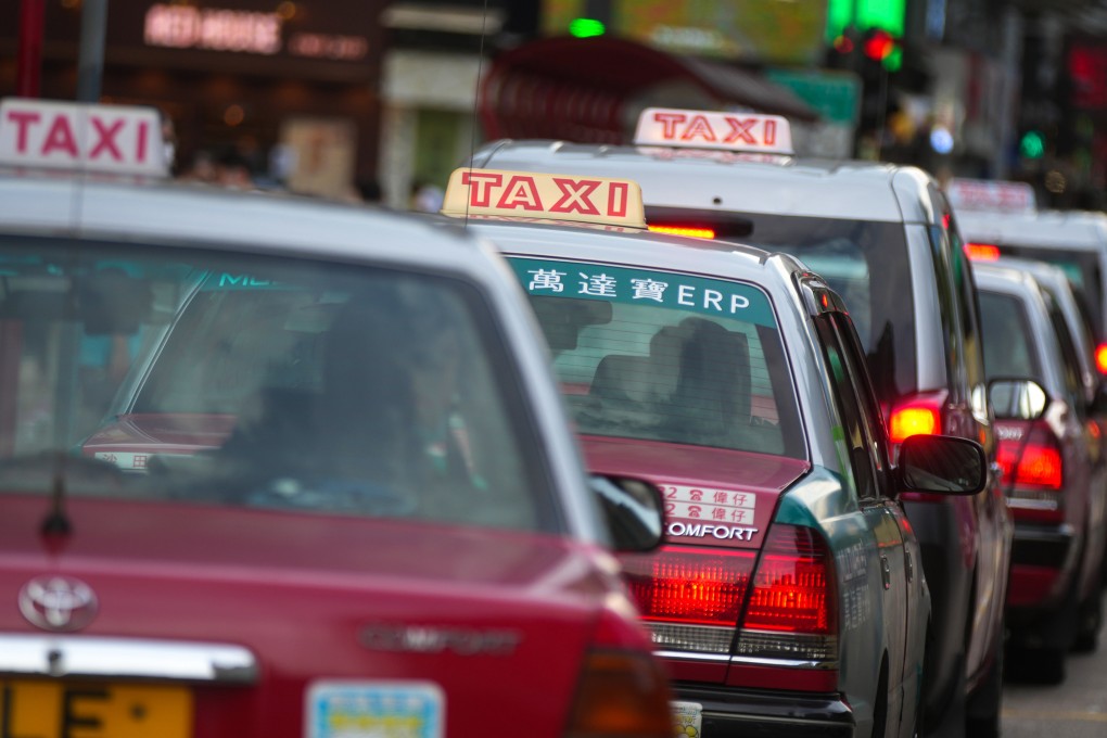 Drivers wait for business in a taxi station in Tai Wai. Photo: Sam Tsang