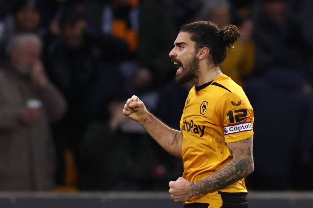 Wolverhampton Wanderers’ Portuguese midfielder Ruben Neves celebrates after scoring his team’s third goal during an English Premier League match against Liverpool at the Molineux stadium on February 4, 2023. Photo: AFP