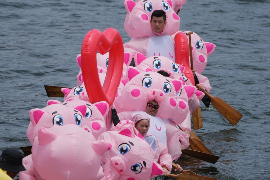 A crew of MTR staff dress up as adorable pigs for the last day of 2023 Hong Kong International Dragon Boat Races. Photo: Sam Tsang
