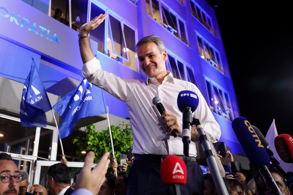 Greek Prime Minister Kyriakos Mitsotakis greeting supporters in Athens. Photo: Reuters