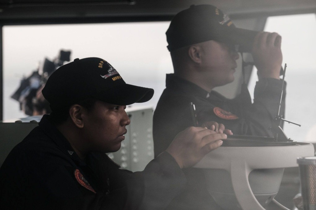 Members of the Philippine coastguard look on during a joint maritime exercise in the South China Sea with the coastguards of Japan and the US earlier this month. Photo: Bloomberg