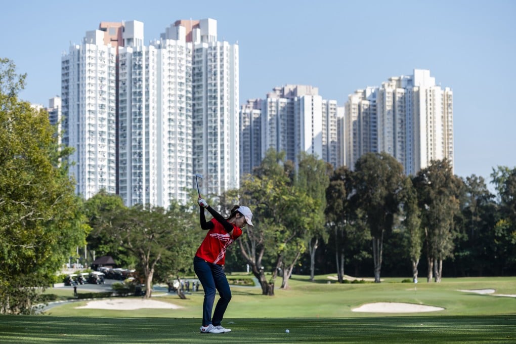 A golfer plays during a competition at the Hong Kong Golf Club on November 25, 2021. The government wants to take back 32 hectares of land, 9.5 hectares of which will be used to build 12,000 public housing flats. Photo: Getty Images
