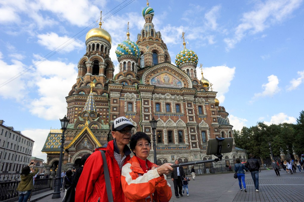 Visitors from China take a selfie in St Petersburg. Russia was one of the top destinations for Chinese tourists before the coronavirus pandemic. Photo: AFP