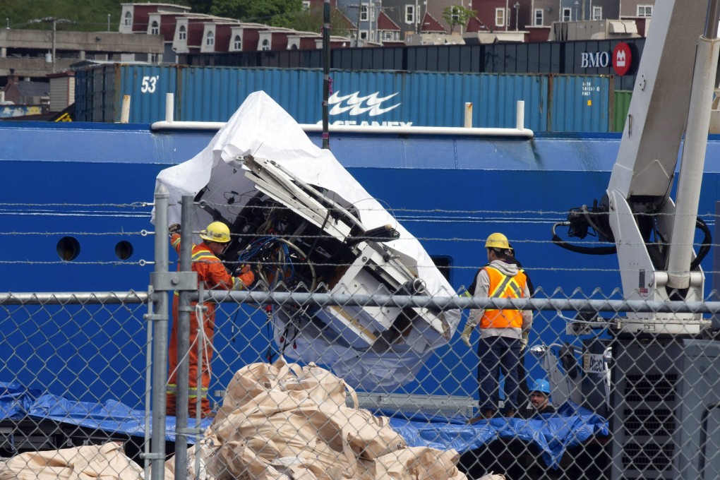 Debris from the Titan submersible is unloaded from the ship Horizon Arctic in St John’s, Newfoundland in Canada on Wednesday. Photo: The Canadian Press via AP