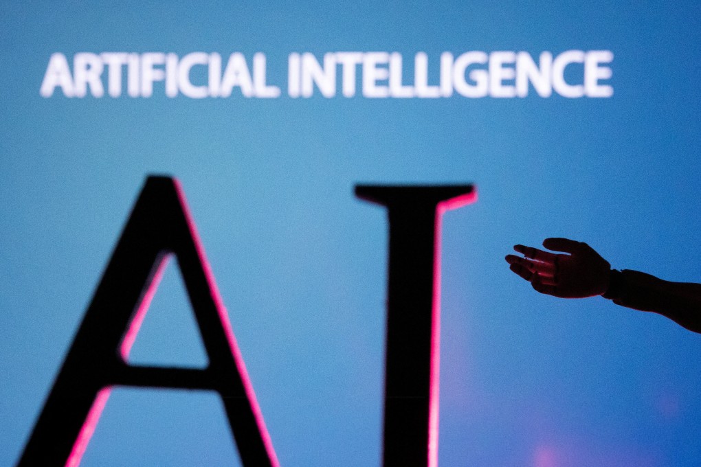 Artificial Intelligence lettering and a miniature robot hand are seen in this photo illustration taken, June 23, 2023. Photo: Reuters