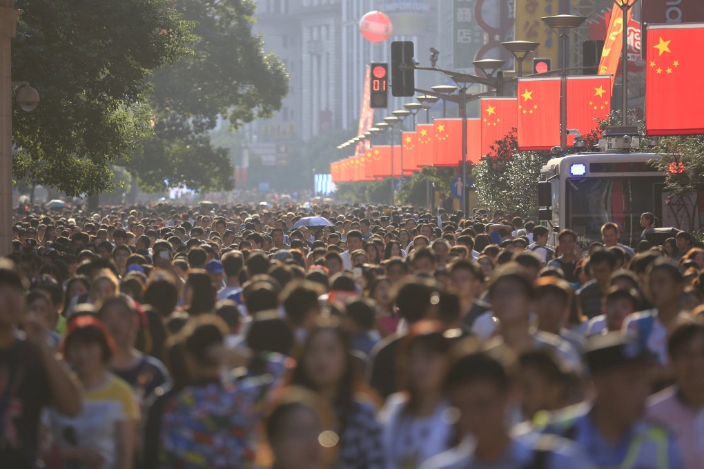 Chinese national flags are seen in Shanghai. Legislation adopted this week is expected to help Beijing use domestic law to retaliate against foreign sanctions. Photo: Reuters