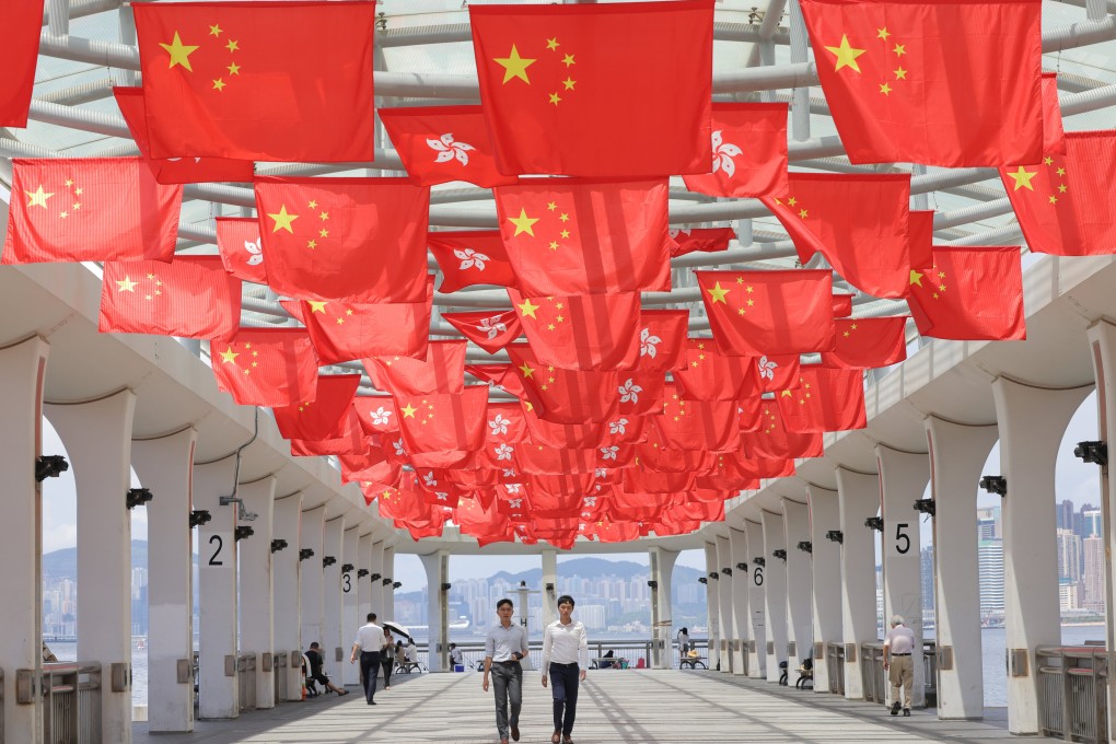 National flags and regional flags are hung over Central No.10 Public Pier for the handover celebration. Photo: Jelly Tse