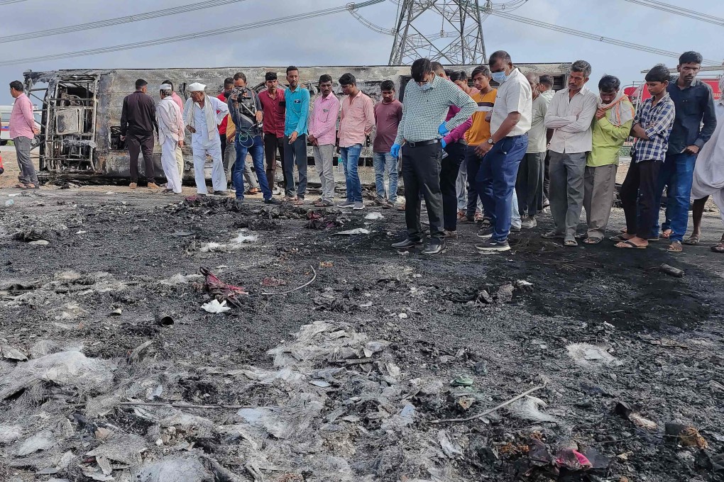 The bus was travelling to the western city of Pune when it hit a pole and overturned on a highway, causing its diesel tank to catch fire. Photo: AFP