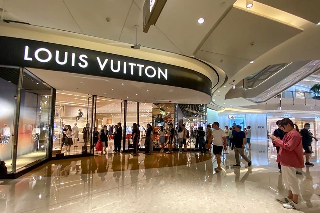 Shoppers line up outside the Louis Vuitton shop in a Shanghai mall on the day LVMH chairman Bernard Arnault visited. Photo: Handout