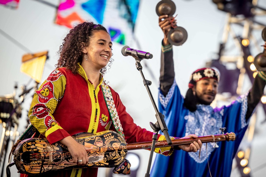 Moroccan artist Hind Ennaira, a female member of a traditional Gnawa band, performs during the 24th edition of the Gnaoua World Music Festival in Essaouira. Photo: AFP