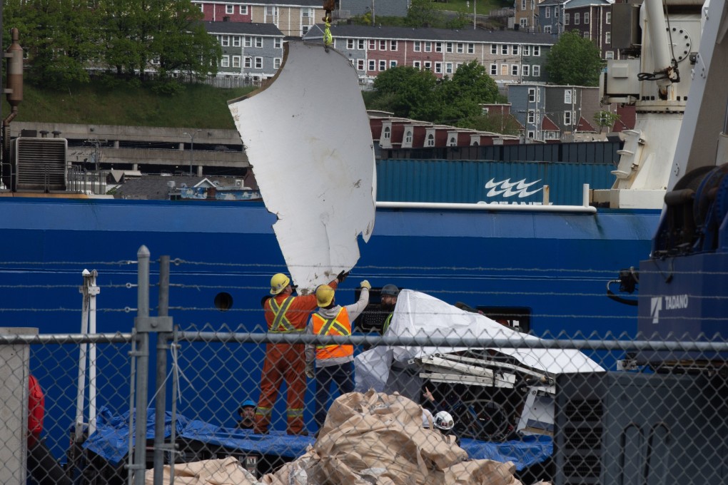 Debris from the Titan submersible, recovered from the ocean floor near the wreck of the Titanic, is unloaded from a ship at the Canadian Coast Guard pier in St John’s, Newfoundland, on June 28. Photo: dpa