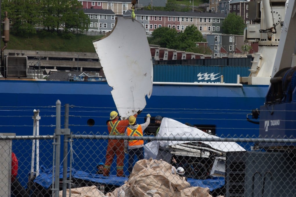 Debris from the Titan submersible, recovered from the ocean floor near the wreck of the Titanic, is unloaded from a ship at the Canadian Coast Guard pier in St John’s, Newfoundland, on June 28. Photo: dpa