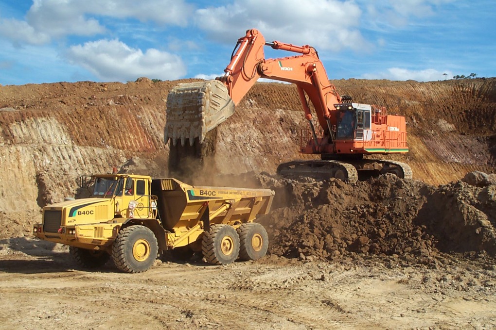A truck is loaded with nickel ore before being prepared for solar drying at a refinery in Yabulu, Australia. Photo: Handout/Reuters