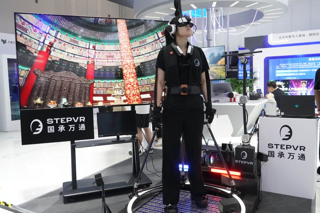 A staff member shows off a VR-powered omnidirectional treadmill at an exhibition during the Global Digital Economy Conference 2023 in Beijing on Tuesday. Photo: Xinhua