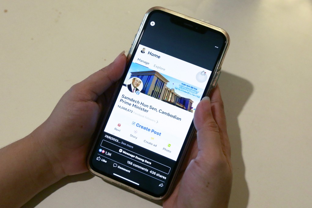 A woman looks at Hun Sen’s Facebook account, which has since been deactivated, on her smart phone in Phnom Penh. Cambodia’s foreign ministry has accused Facebook parent Meta’s oversight board of interfering in the country’s internal affairs. Photo: EPA-EFE