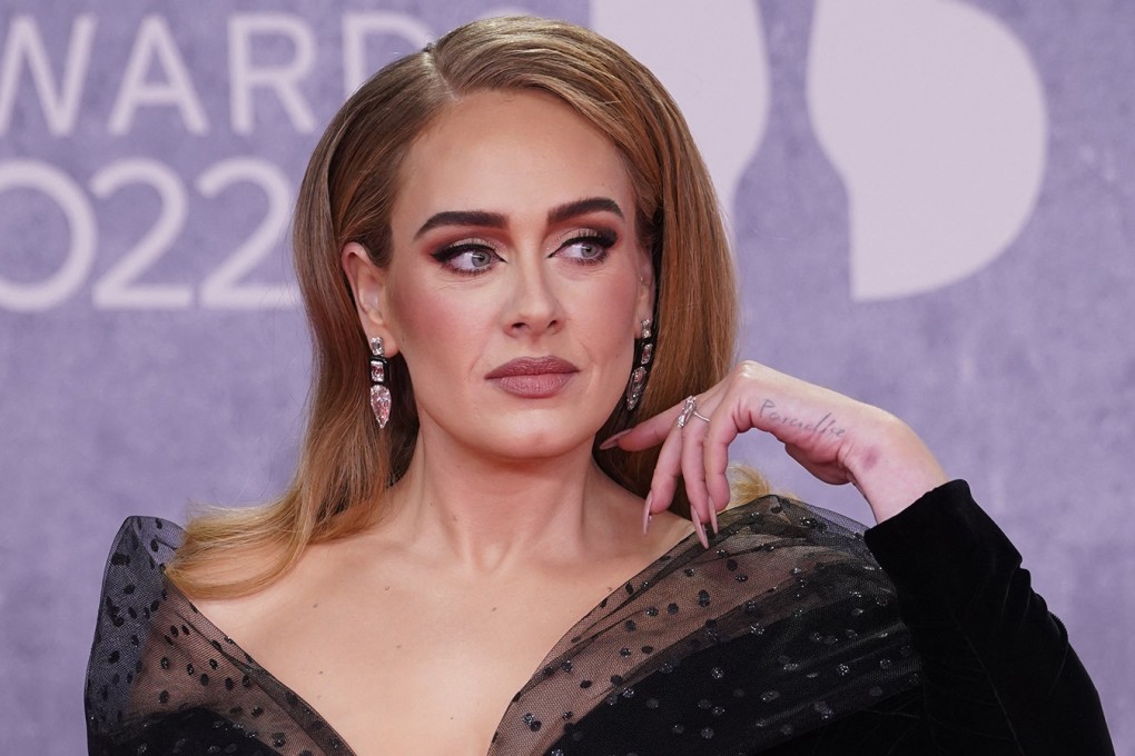 Adele poses on the red carpet at the Brit Awards in London in February 2022. Photo: TNS