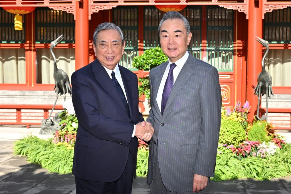 China’s top diplomat Wang Yi (right) meets Yohei Kono, head of the Japanese Association for the Promotion of International Trade, in Beijing on Thursday. Photo: Xinhua