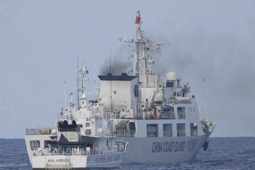 A Chinese coastguard ship (right) allegedly obstructs Philippine coastguard vessel Malabrigo as it provided support during a resupply mission near Second Thomas Shoal in the disputed South China Sea. Photo: Philippine coastguard via AP