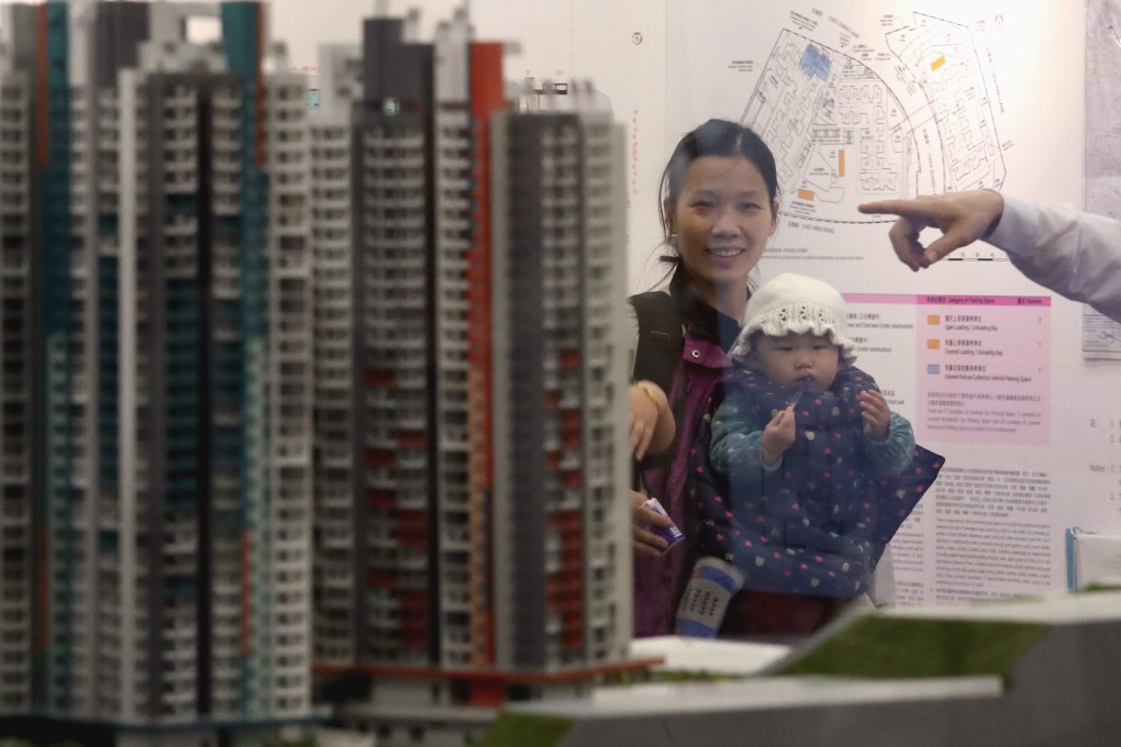 Housing Authority (HA) distributes application forms for the latest sale of Home Ownership Scheme flats at the HA customer service centre in Lok Fu on 30 March 2017. Photo: Nora Tam