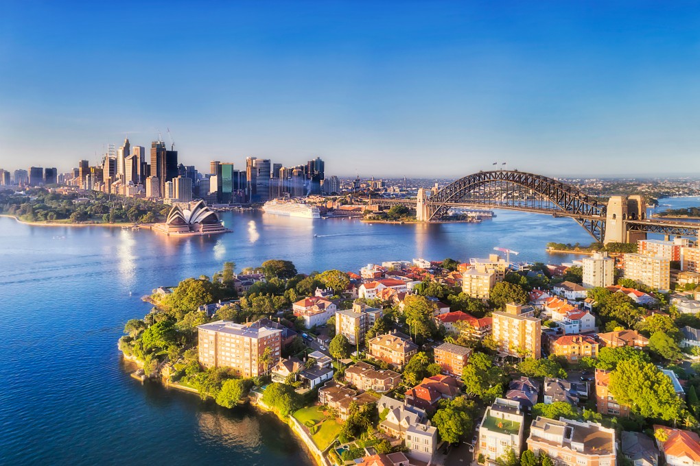 Residential and commercial properties are seen near the Opera House and Harbour Bridge in Sydney, one of Australia’s biggest – and priciest – housing markets. Photo: Shutterstock