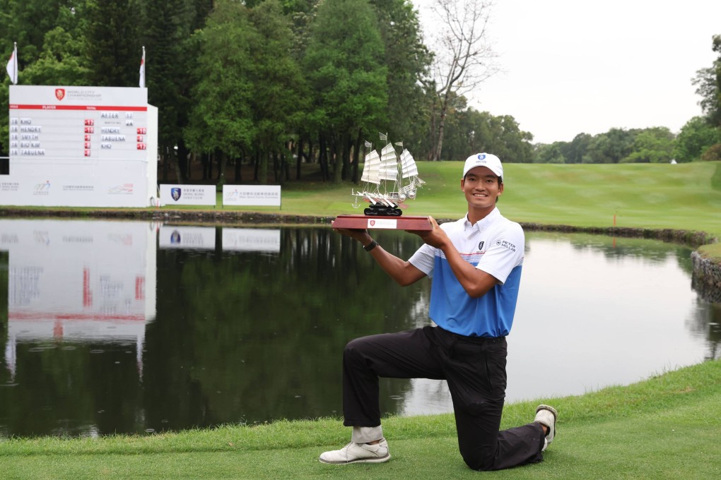 Taichi Kho of Hong Kong holds the trophy after winning the World City Championship at Hong Kong Golf Club, in Fanling. Photo: Yik Yeung-man