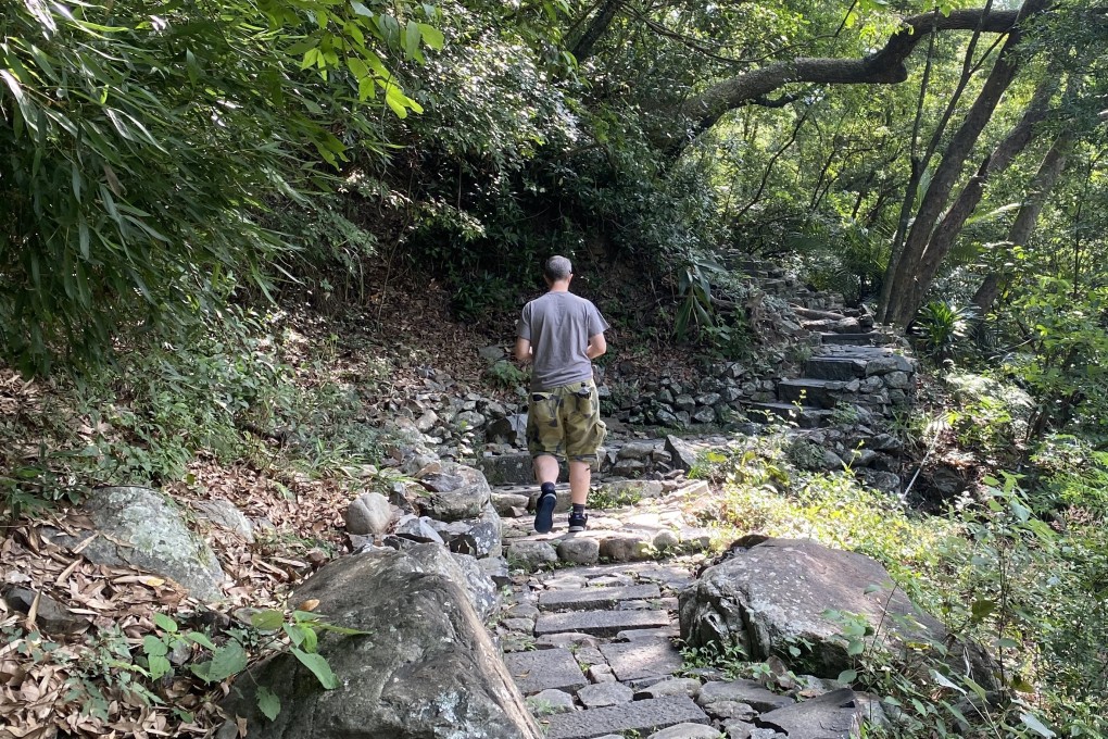 A hiker walks along the Guguan hiking trail in Taiwan. Photo: Tamara Hinson