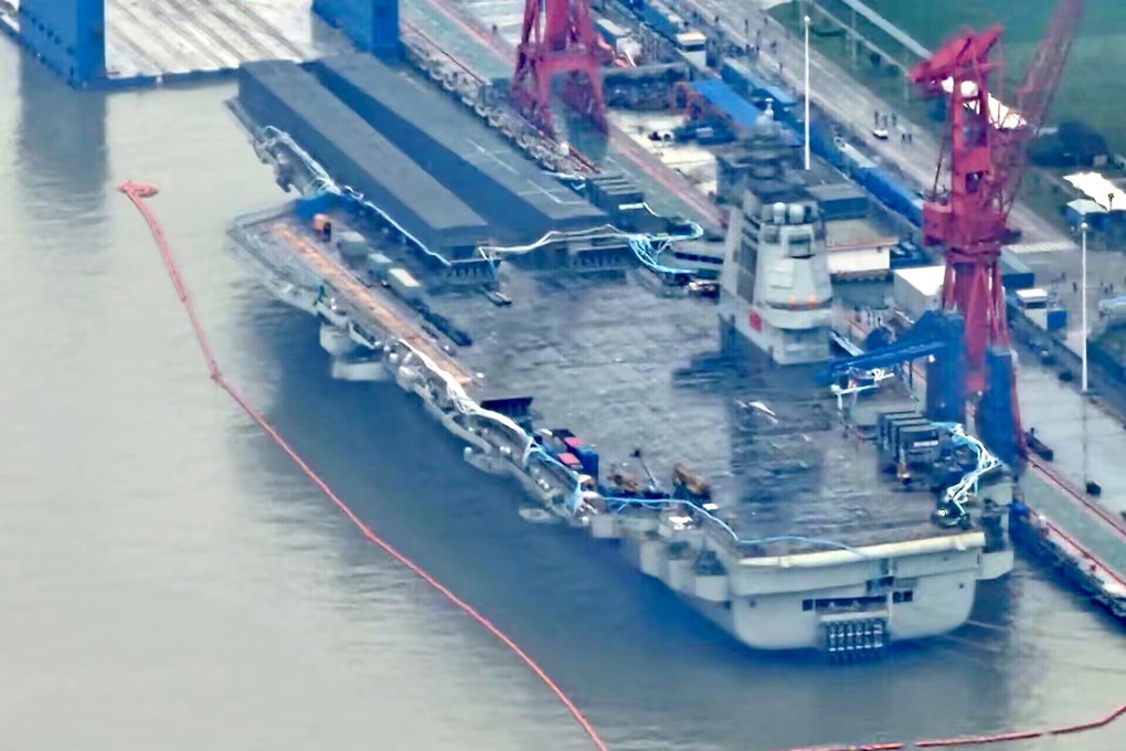 The cover on a runway on the Fujian has been removed, signalling catapult launch tests could be in the offing. Photo: Weibo