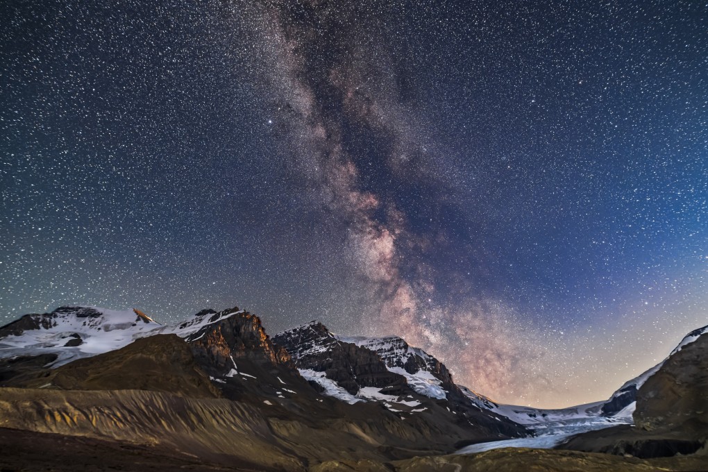 The Milky Way and galactic core area as seen over mountains in the Columbia Icefield, in North America’s Rocky Mountains. Dark sky tourism, or astrotourism, to see such stunning sights of stars in the night sky is becoming increasingly popular. Photo: Getty Images