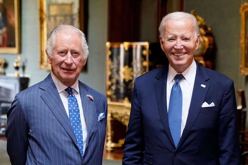 Britain’s King Charles III and US President Joe Biden in the Grand Corridor at Windsor Castle in Windsor. Photo: AFP