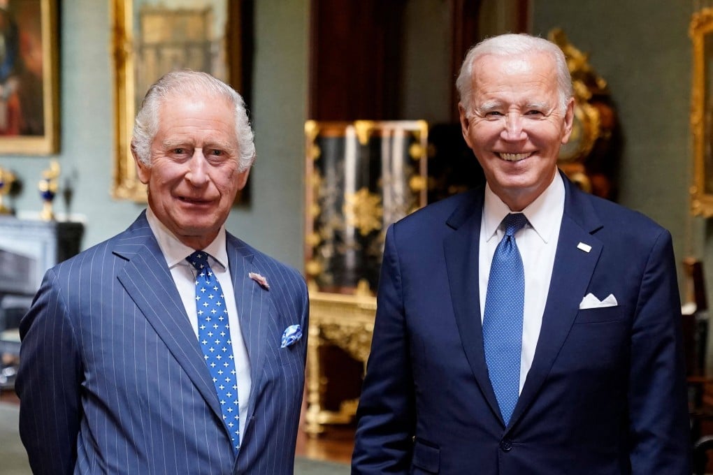 Britain’s King Charles III and US President Joe Biden in the Grand Corridor at Windsor Castle in Windsor. Photo: AFP