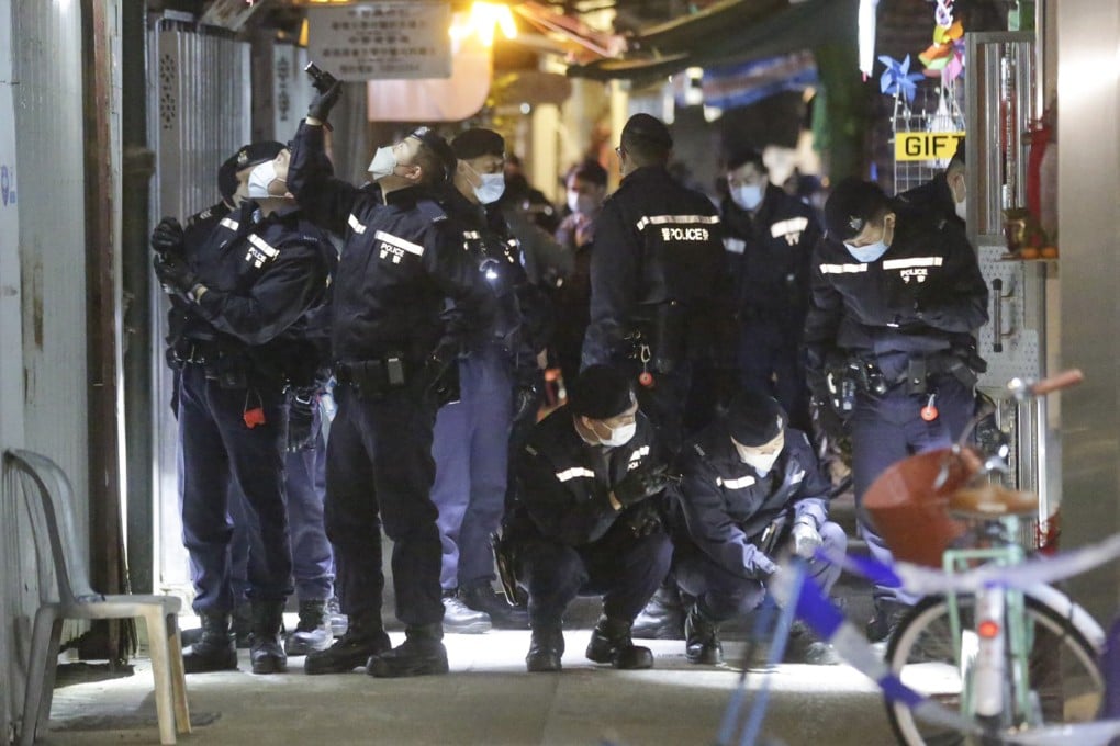 Hong Kong police investigate an incident in which an officer was attacked, and a man was shot three times. Photo: Handout