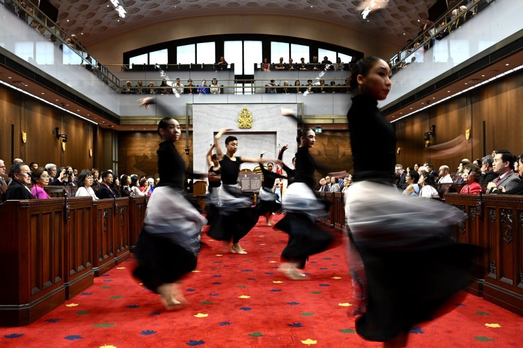 Dancers from Goh Ballet perform during the National Remembrance Ceremony for the 100th Anniversary of the Introduction of the Chinese Exclusion Act, on June 23 in the Senate Chamber in Ottawa. Photo: The Canadian Press via AP