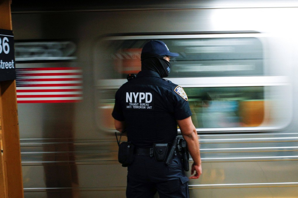 A New York Police officer patrols an underground station. China on Monday issued a warning to its citizens to beware of “entrapment” by American police. Photo: Reuters