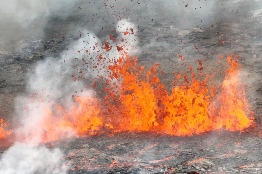 Lava spurts after the eruption of a volcano, on the Reykjanes peninsula, near the capital Reykjavik, in southwest Iceland on Monday. Photo: Juergen Merz via Reuters