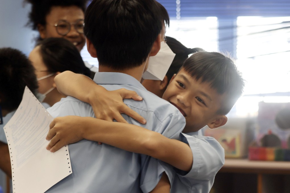 Happy students receive their allocation results at Yaumati Catholic Primary School (Hoi Wang Road). Photo: Jonathan Wong