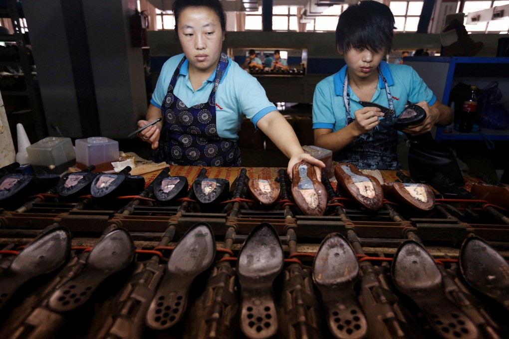 Employees at a shoe factory in Wenzhou, Zhejiang province, China. Photo: Reuters