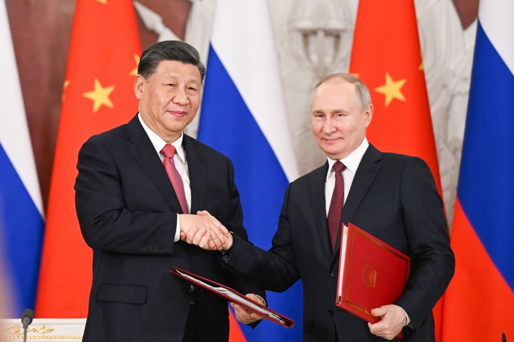 Chinese President Xi Jinping and Russian counterpart Vladimir Putin shake hands after the signing of a joint statement, at the Kremlin in March. Photo: Xinhua